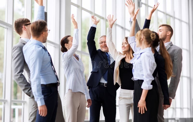 Business team celebrating successful Odoo implementation